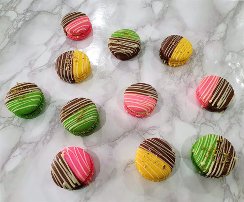 10 Chocolate Dipped Barfi Filled Macarons.